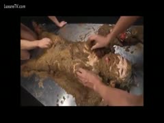 A bitch's sexy body was smeared in a foul-smelling, wet poop.